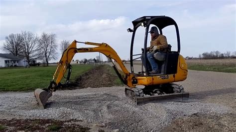 digging driveway mini excavator|mini excavator tips and tricks.